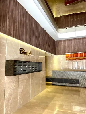 a lobby with a sign that reads blvd on the wall at Magnifique appartement à Guéliz, résidence de luxe in Marrakech