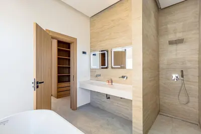 a bathroom with a sink and a mirror at Villa Luxe Neuve , Piscine XXL , Sans vis-à-vis in Marrakech