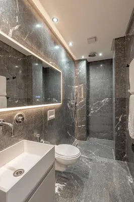a bathroom with a toilet and a sink and a shower at 3Br 2Ba Apartment in Marrakech in Marrakech