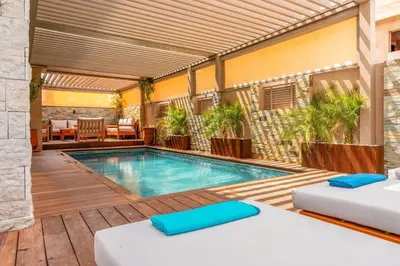 a swimming pool in the middle of a patio at Villa Lina in Marrakech