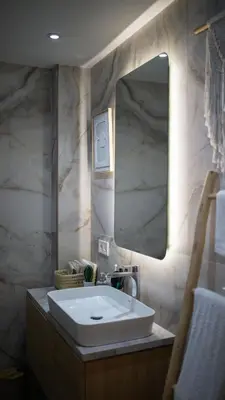 a bathroom with a sink and a large mirror at Cosy Victor hugo in Marrakech