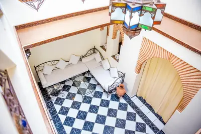 an overhead view of a living room with a checkered floor at Riad Palm and Pool 2 in Marrakech