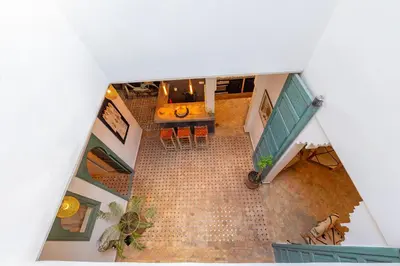an overhead view of a room with a tile floor at Riad E&J Marrakech Médina 5 ch climatisées, piscine chauffée, EXCLUSIF in Marrakech