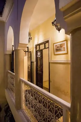 a hallway of a house with a balcony at Riad Light Of Sun in Marrakech