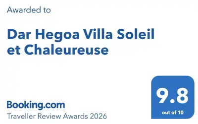 a screenshot of a cell phone with the text dat neza villa solil at Votre Villa Soleil et Chaleureuse in Marrakech