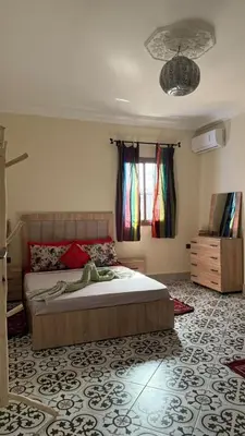 a bedroom with a large bed in a room at traditional apartment in Marrakech