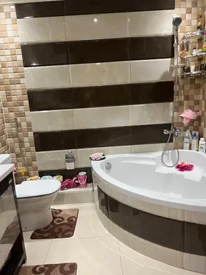a bathroom with a tub and a toilet at Villa in Marrakesh Targa with swimmingpool in Marrakech