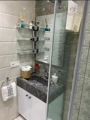 a bathroom with a shower and a sink at Séjour agréable à marrakech in Marrakech