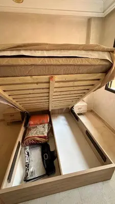 a drawer in the bottom bunk of a bunk bed at Sofia Palmeraie - High standing in Marrakech