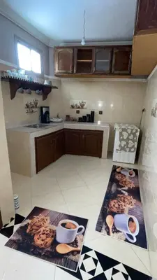 a kitchen with two cups of coffee on the floor at Marrakech,Massira1 in Marrakech