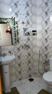 a bathroom with a sink and a toilet at Marrakech,Massira1 in Marrakech