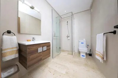 a bathroom with a shower and a sink and a toilet at 2 Bedroom flat - Marrakech in Marrakech
