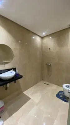 a bathroom with a sink and a toilet at VILLA MARRAKECH - Centre Ville in Marrakech