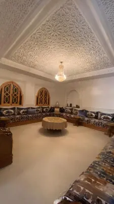 a large room with a table and a ceiling at VILLA MARRAKECH - Centre Ville in Marrakech