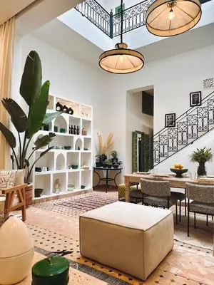 a living room with a couch and a table at Riad Baba in Marrakech