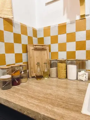 a counter with a bunch of food items on it at Riad Baba in Marrakech