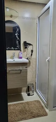 a bathroom with a sink and a shower at Cozy Duplex in downtown Marrakesh- 7mn from Gueliz in Marrakech