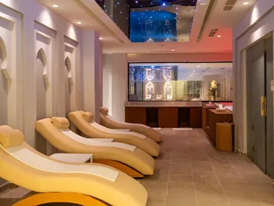 a row of seats in a waiting room at Pickalbatros SUNGO Club - All Inclusive in Marrakech