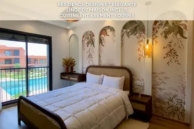 a bedroom with a large bed and a pool at Alba cosy - 3 piscines, Wifi HD, Parc de jeux in Marrakech