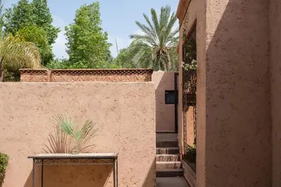 an entrance to a building with an open door at Lankah - Authentic villa with private heated pool close to city center in Douar Caïd Layadi