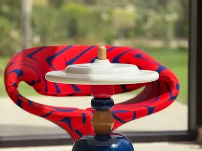 a red and blue chair with a red and blue object at Luxury Villa Pool with Atlas View in Moussiha