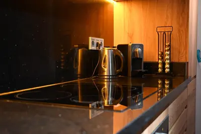 a counter top with coffee cups on top of it at Whispers of NATURE in Marrakech