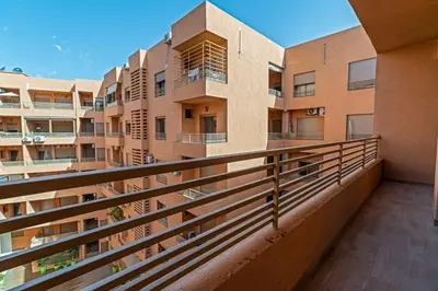 an empty balcony of an apartment building at Écrin Soleil proche Guéliz et sécurisé in Marrakech