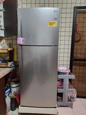 a stainless steel refrigerator in a kitchen at Comfortable apartment for families in Marrakech