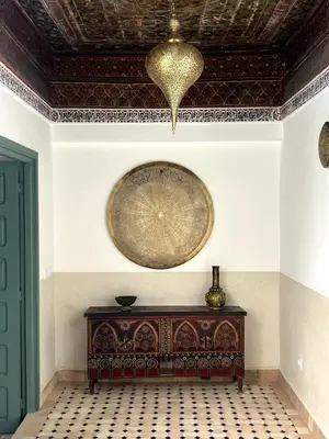 a room with a table and a ceiling at Riad du Musée - Private - 3 beds - Heart of Medina in Marrakech