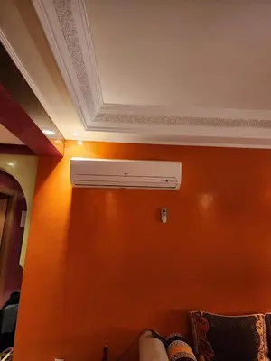 a room with a wall with a air vent at Comfortable apartment for families in Marrakech