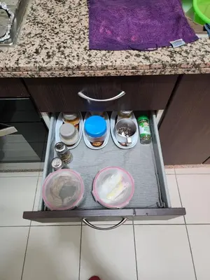 a drawer in a counter with some food in it at Comfortable apartment for families in Marrakech