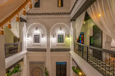 a hallway of a house with stairs and windows at Dar Bonita in Marrakech