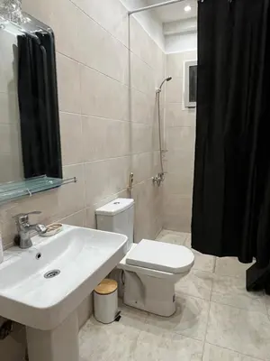 a bathroom with a sink and a toilet and a shower at GZ Loft in Marrakech