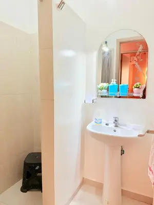 a bathroom with a sink and a mirror at N9 Parfait Top Près De Gueliz in Marrakech