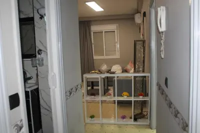 a room with a shelf with toys in it at Appartement mamá MK in Marrakech