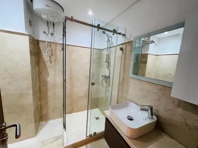 a bathroom with a shower and a sink at Perle garden in Marrakech