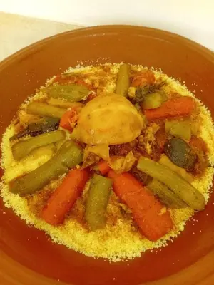 a bowl of food with green beans and vegetables at Dar Mayleya in Marrakech