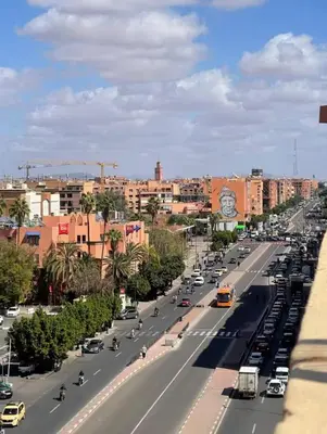 a busy city street with cars on a highway at Stylish Hivernage Studio in Marrakech
