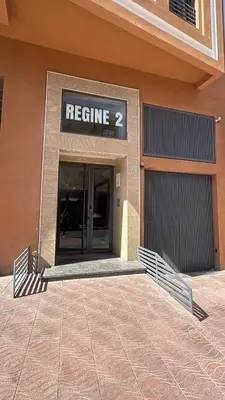 a building with a sign that reads rescue at Regine in Marrakech