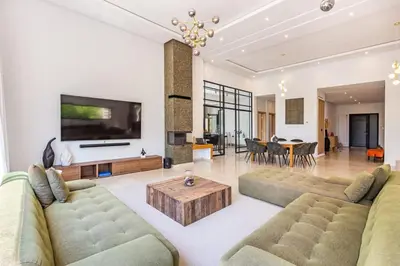 a living room with two couches and a coffee table at Family villa in Marrakech in Marrakech