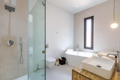 a bathroom with a tub and a sink and a shower at Family villa in Marrakech in Marrakech