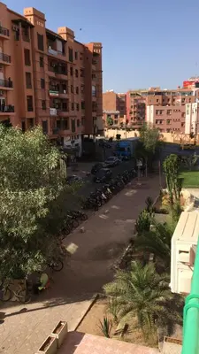 a group of bikes parked in a parking lot at Luxury Balnéo appartement in Marrakech
