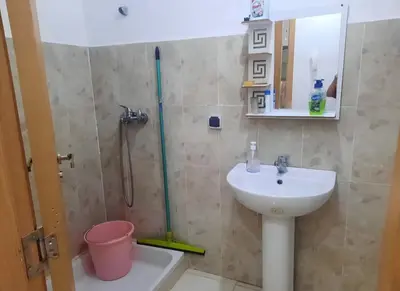 a bathroom with a sink and a shower at Shawna Home in Marrakech