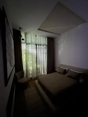 a bedroom with a large bed and a window at studio à marrakech in Marrakech