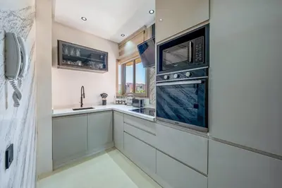a kitchen with two ovens and a sink at Marrakech, mon amour in Marrakech