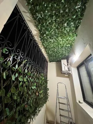 a room with a plant on the ceiling at aboube gulize marrakeche in Marrakech