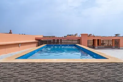 a swimming pool on the roof of a house at Rooftop piscine-new appartment - centre ville in Marrakech