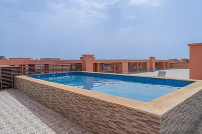 a swimming pool on the roof of a building at Rooftop piscine-new appartment - centre ville in Marrakech