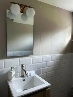 a bathroom with a sink and a mirror at Villa Corail in Marrakech