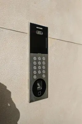 a remote control attached to the side of a wall at NEW 1BR Apart Queensize AC 5 min to CityCenter in Marrakech